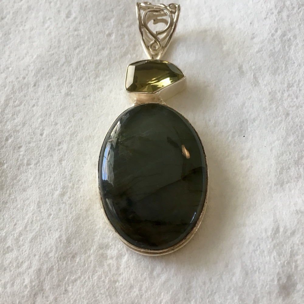Gemstone and silver pendant.